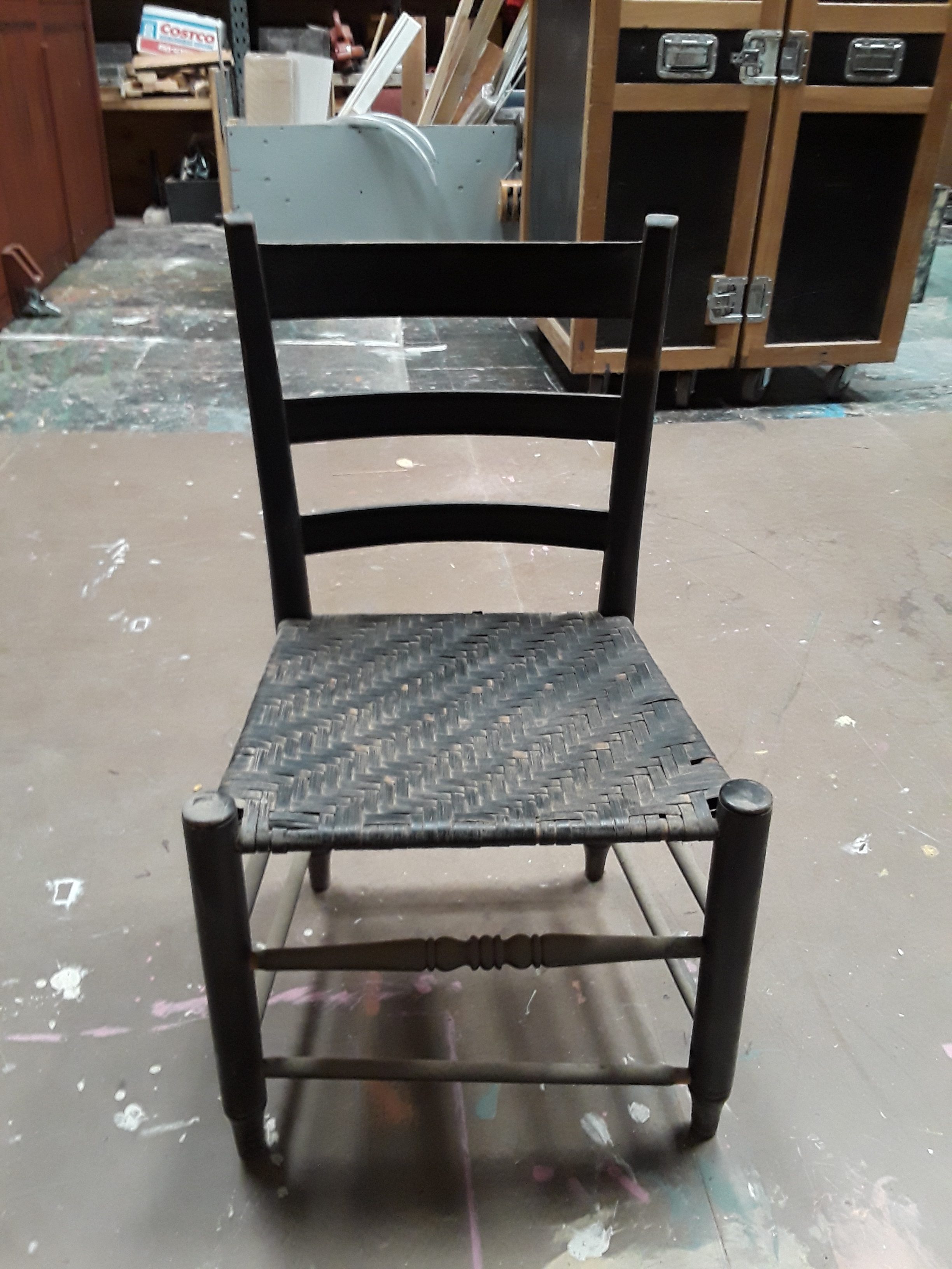 chair (black, wicker seat)