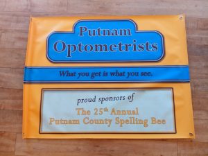 Spelling Bee Putnam Optometrists Sign 29.5 x 40